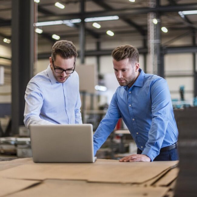Business owner reviewing factors that may affect business valuation and a future sale