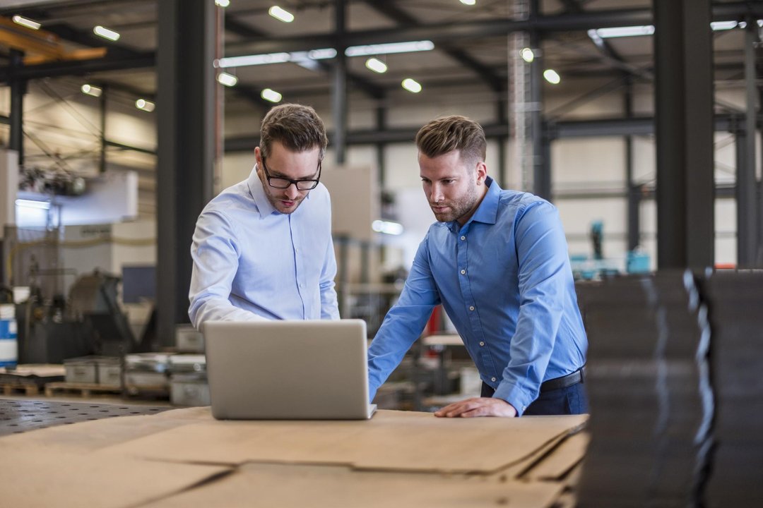 Business owner reviewing factors that may affect business valuation and a future sale