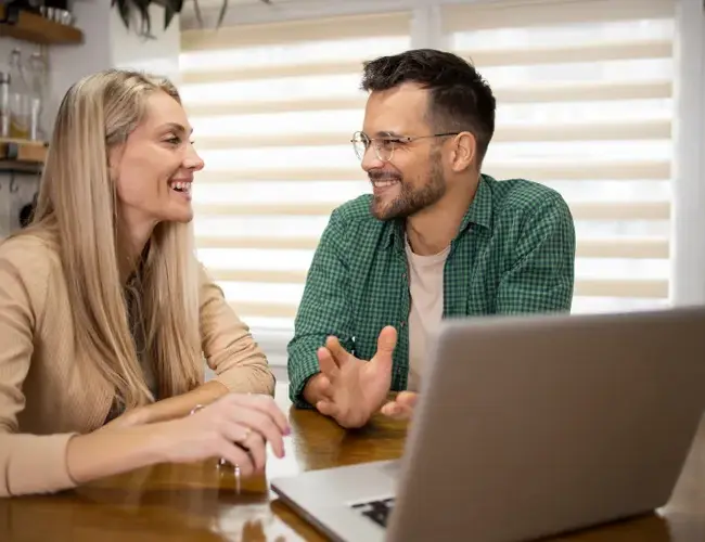 Millennial couple reviewing retirement savings and long-term financial planning