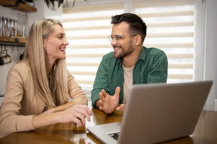 Millennial couple reviewing retirement savings and long-term financial planning
