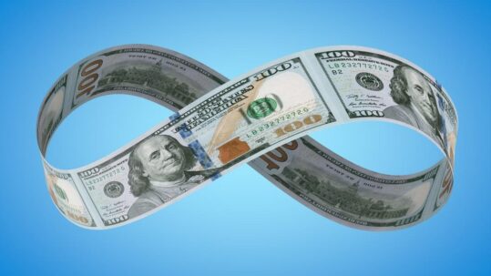 Retired couple reviewing retirement income planning and monthly retirement withdrawals