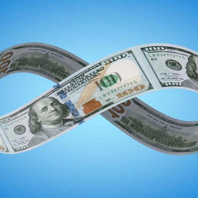 Retired couple reviewing retirement income planning and monthly retirement withdrawals