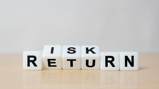 Retired couple reviewing sequence of returns risk and retirement income planning
