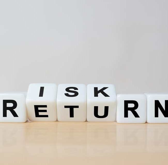 Retired couple reviewing sequence of returns risk and retirement income planning