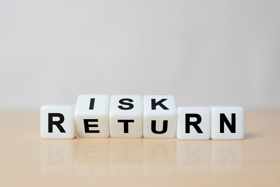 Retired couple reviewing sequence of returns risk and retirement income planning