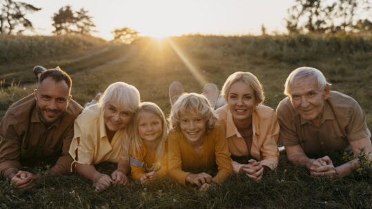 Family discussing an estate plan and inheritance decisions to help prevent future family conflict