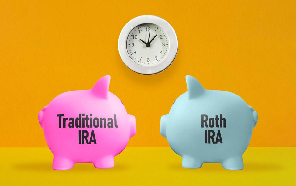 Retirement planning documents and calculator representing a comparison of traditional IRA and Roth IRA tax strategies.